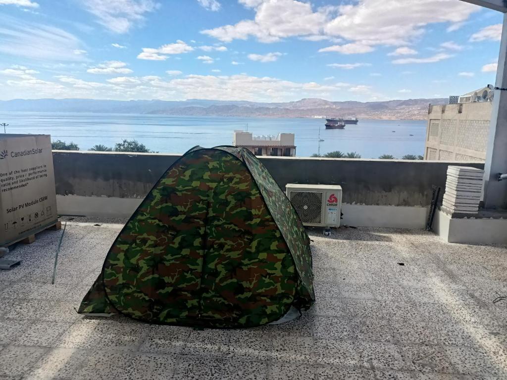 a tent sitting on the roof of a building at Peace Roza in Aqaba
