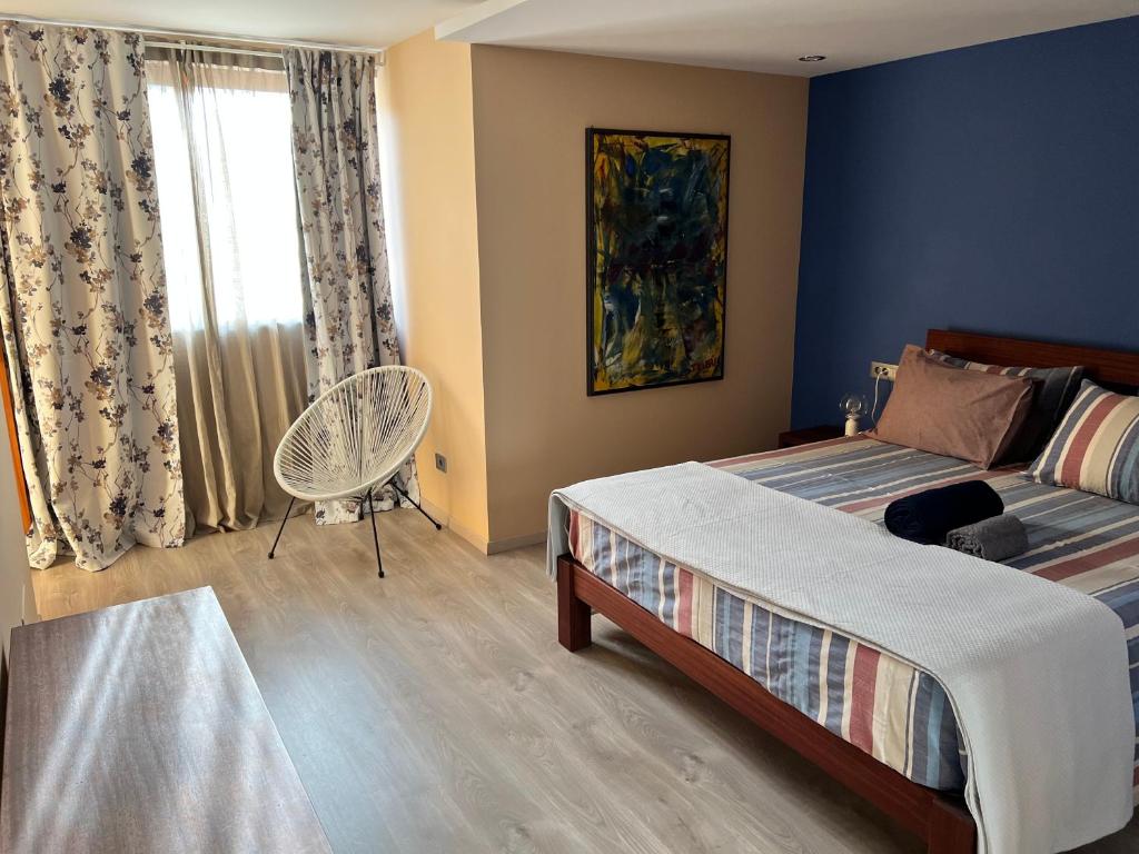 Postel nebo postele na pokoji v ubytování Orietta Residencial