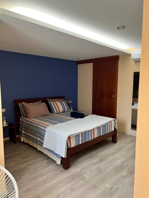 Postel nebo postele na pokoji v ubytování Orietta Residencial