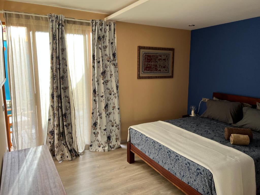 Postel nebo postele na pokoji v ubytování Orietta Residencial