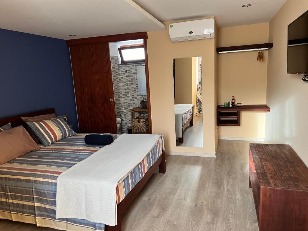Postel nebo postele na pokoji v ubytování Orietta Residencial