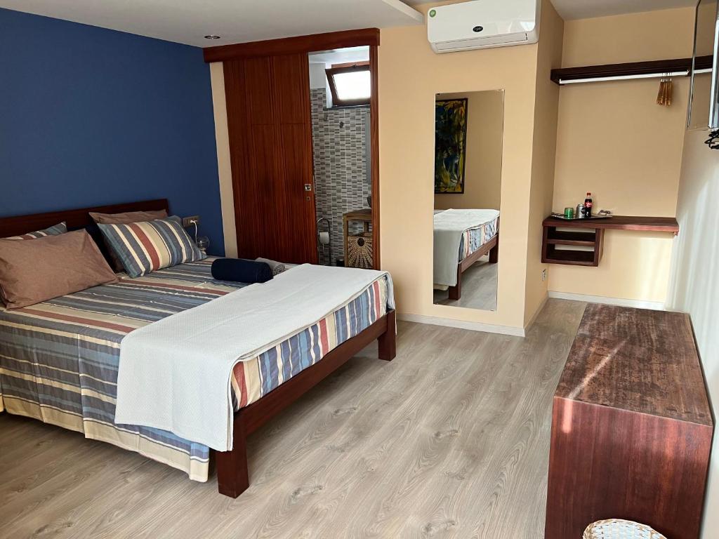 Postel nebo postele na pokoji v ubytování Orietta Residencial