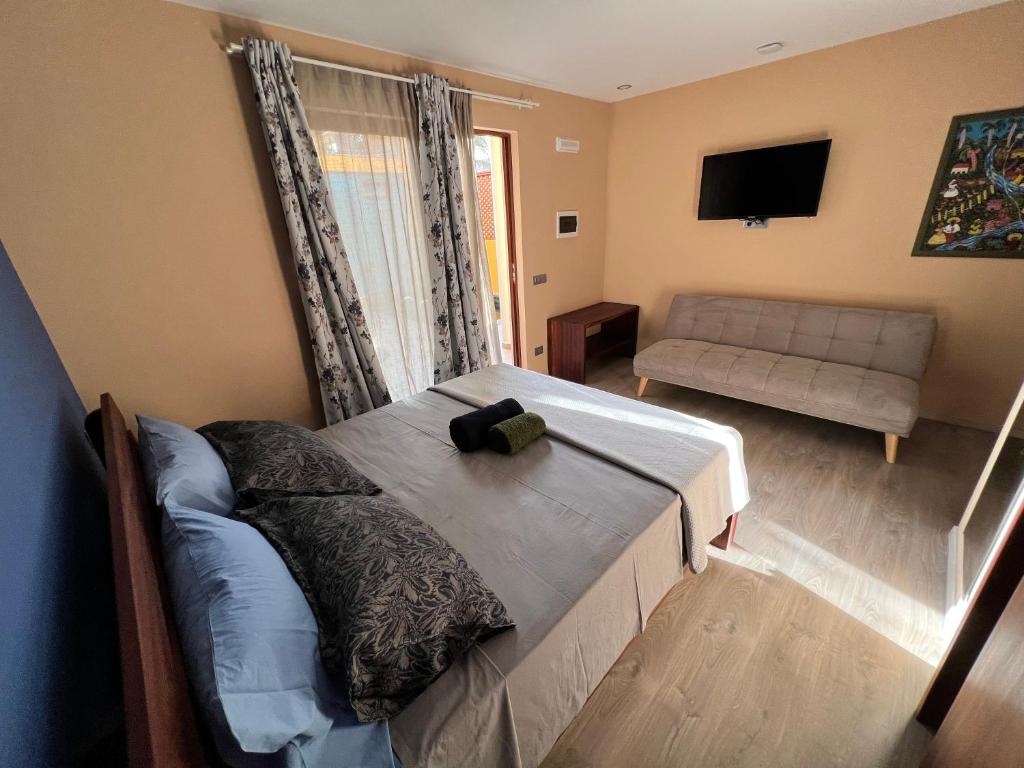 Postel nebo postele na pokoji v ubytování Orietta Residencial