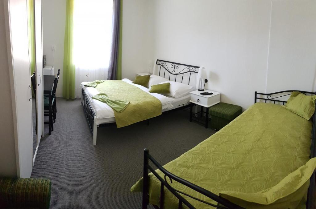 Postel nebo postele na pokoji v ubytování Domček 118