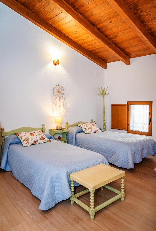 A bed or beds in a room at Casa rural la balsa