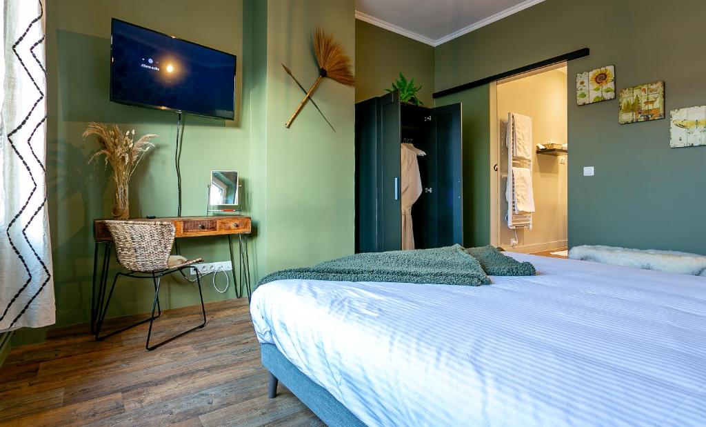 Postel nebo postele na pokoji v ubytování The Newport Lodge - incl 3h Wellness & use Ebikes & breakfast