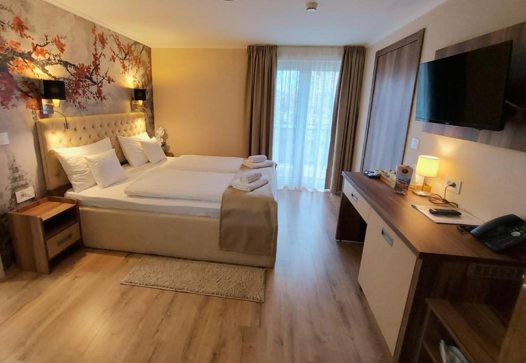 Postel nebo postele na pokoji v ubytování Papuli rooms 4U