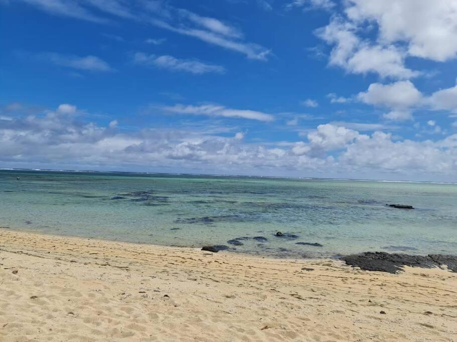 a beach with the ocean and the sky at Vacation Beach House South of Mauritius - Riambel in Riambel