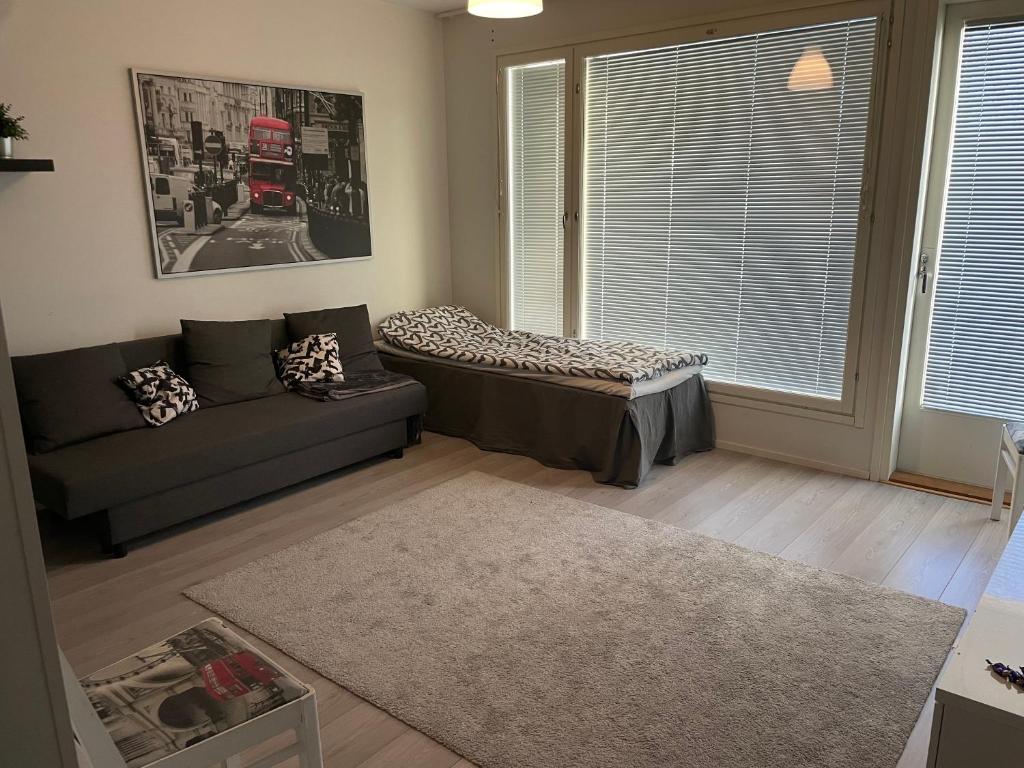 Posezení v ubytování Style 1BR with sauna,Tornio city