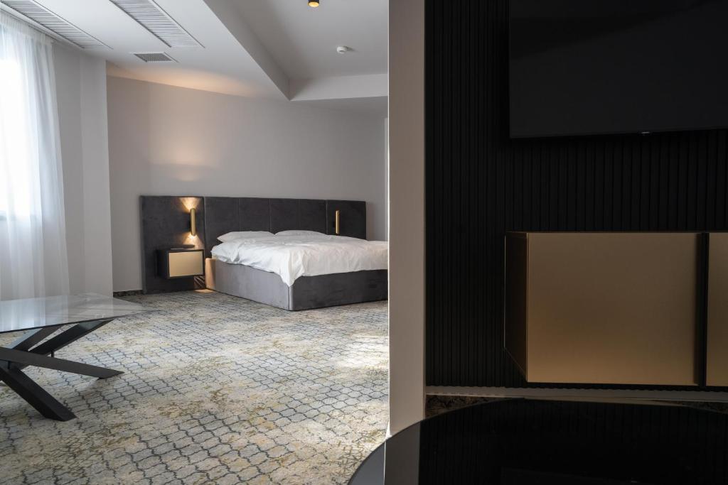 Postel nebo postele na pokoji v ubytování Hotel Cristal