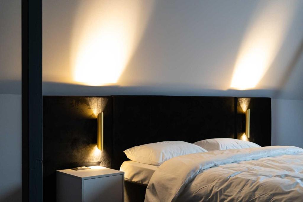 Postel nebo postele na pokoji v ubytování Hotel Cristal