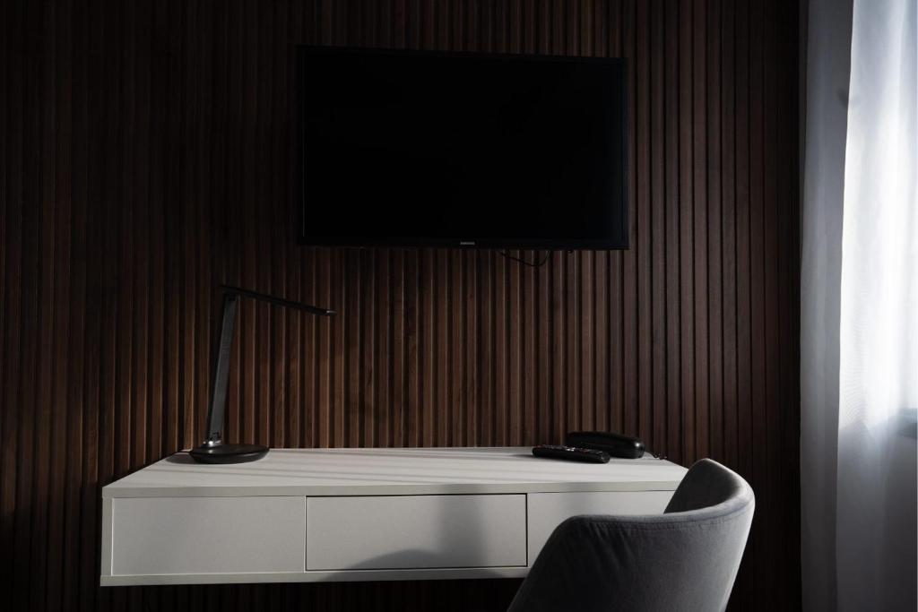 TV a/nebo společenská místnost v ubytování Hotel Cristal