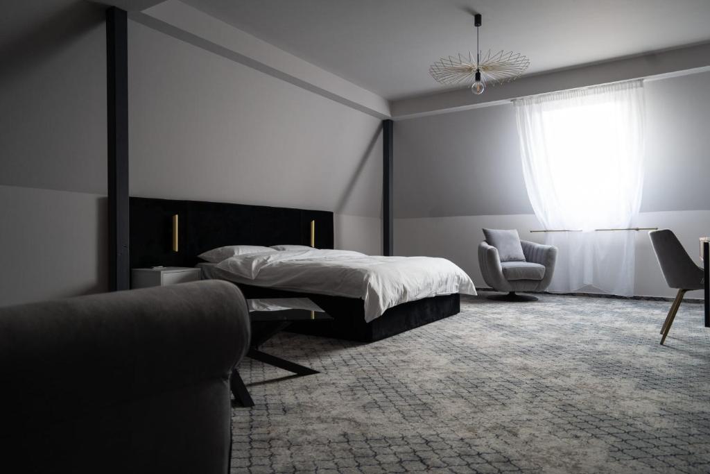 Postel nebo postele na pokoji v ubytování Hotel Cristal