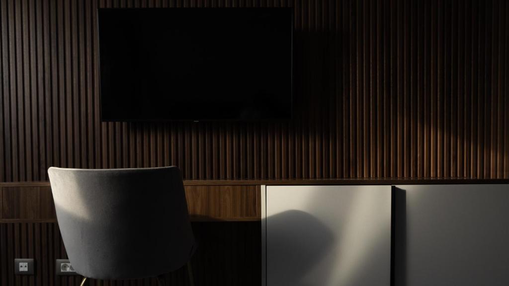 TV a/nebo společenská místnost v ubytování Hotel Cristal