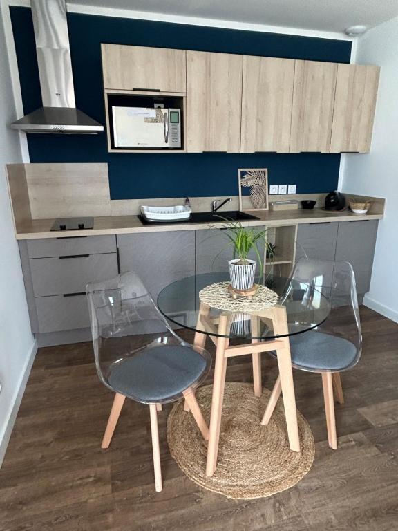 Kuchyňa alebo kuchynka v ubytovaní Charmant logement neuf