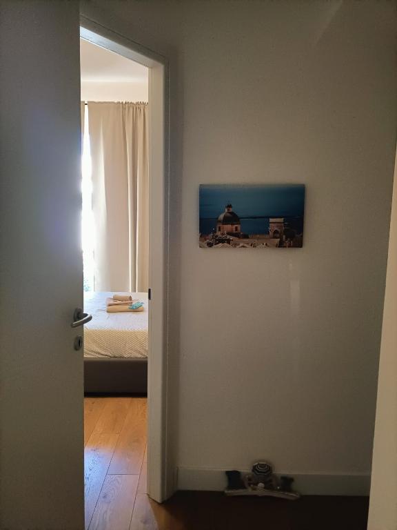 Łóżko lub łóżka w pokoju w obiekcie Le stanze di elisa
