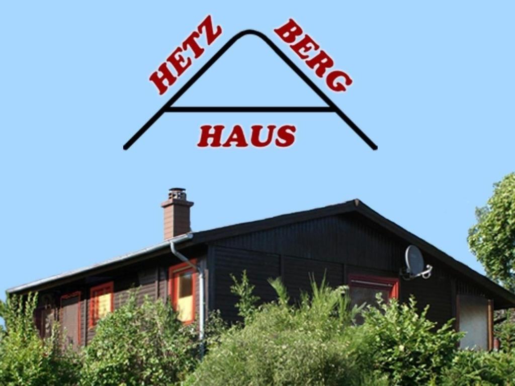 a house with the word haks in front of it at Charmantes Ferienhaus in Lauter mit Großem Garten in Laubach