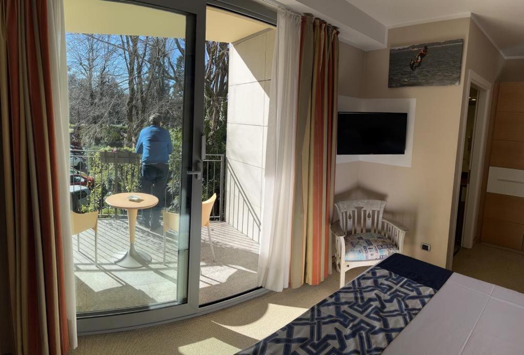 Postel nebo postele na pokoji v ubytování Hotel Sporting Brugherio