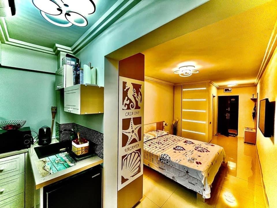 a small bedroom with a bed in a room at Casa Ovi in Saturn