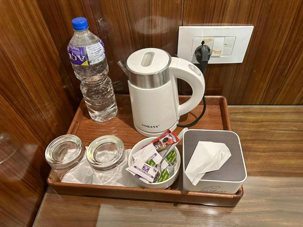 Příslušenství pro přípravu čaje a kávy v ubytování YULOKO GUEST HOUSE
