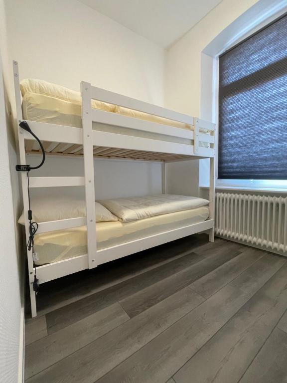 Postel nebo postele na pokoji v ubytování Hotel Lingemann