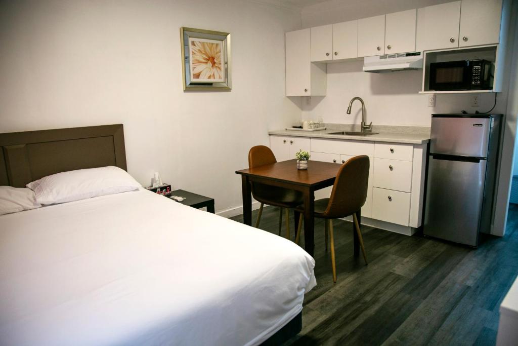 Kuchyň nebo kuchyňský kout v ubytování Westview Centre Motel Ltd