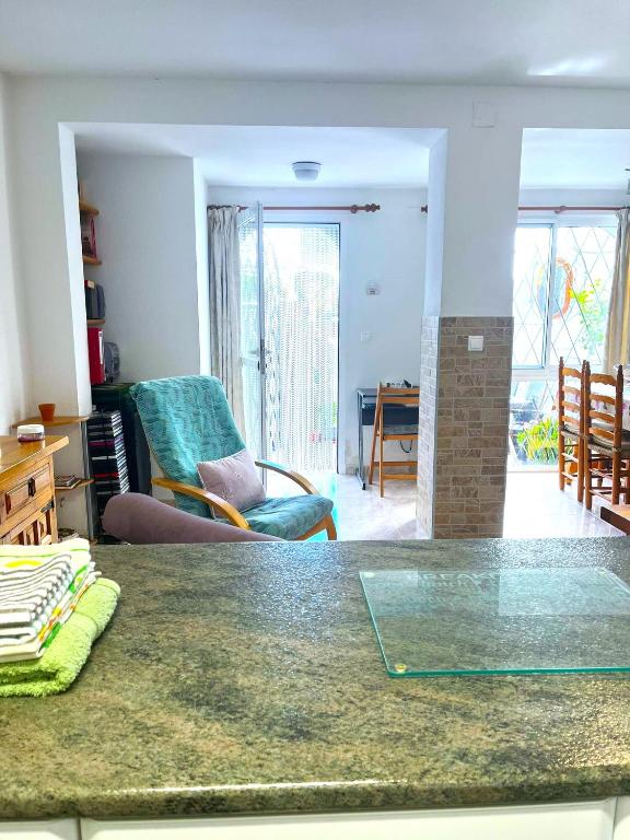 A seating area at Beautiful Air Conditioned bungalow - Alkabir