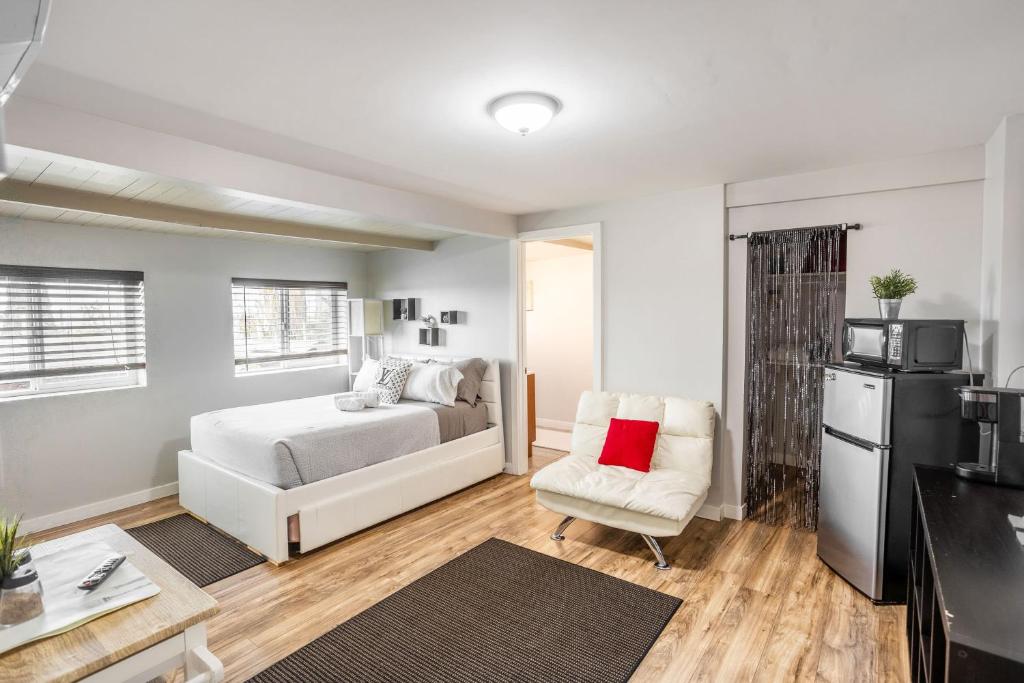 a living room with a bed and a kitchen at Special Studio in Center of San Diego in San Diego