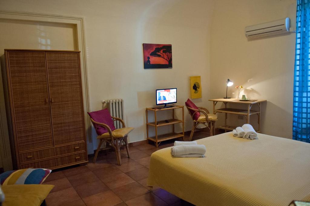 Postel nebo postele na pokoji v ubytování Ivana B&B