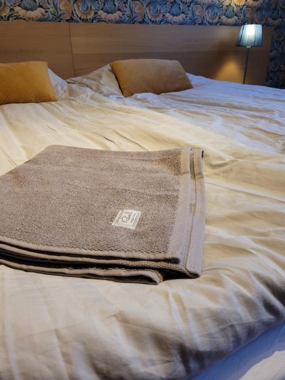 Postel nebo postele na pokoji v ubytování Bokskogens Guesthouse