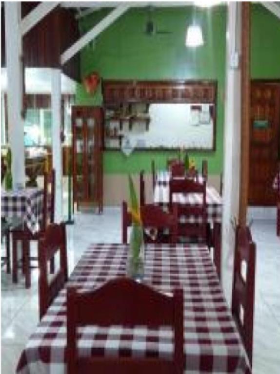 Restaurace v ubytování Pousada Coração Verde