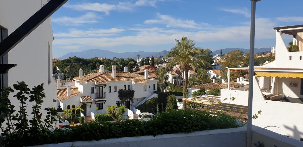 a view of a town from a building at Aldea Blanca Cute in Marbella