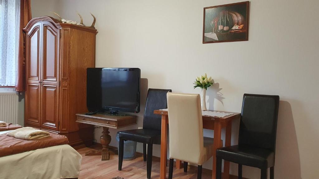 TV a/nebo společenská místnost v ubytování Kékszilva Vendégház