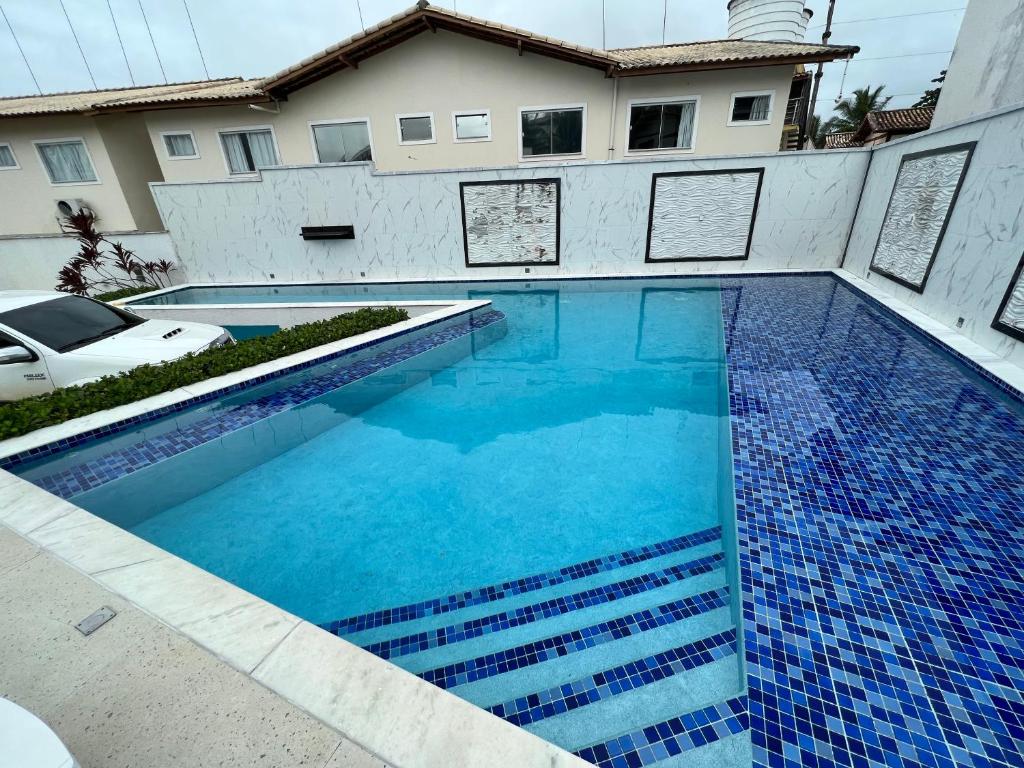 Kolam renang di atau dekat dengan Apto Duplex cond. Vila dos Diamantes #26
