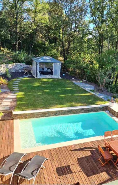 Photo de la galerie de l'établissement Villa familiale avec piscine jacuzzi terrasse, à Prades-le-Lez