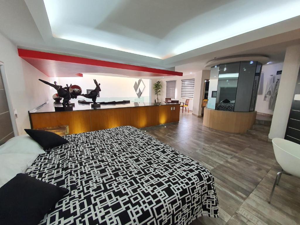 Postel nebo postele na pokoji v ubytování Hotel Alcampo