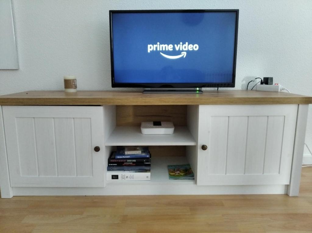 Telewizja i/lub zestaw kina domowego w obiekcie acogedor, con garaje, céntrico.