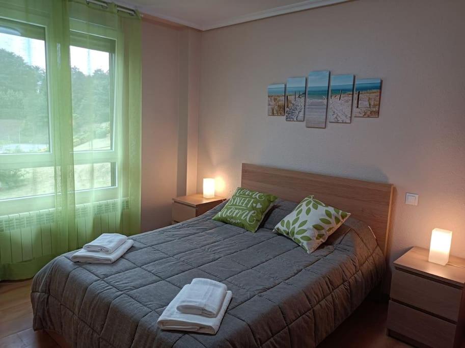 Postel nebo postele na pokoji v ubytování Apartamento de playa en Suances