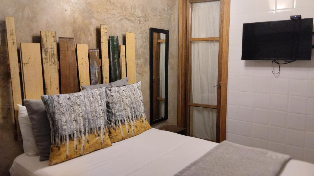 Postel nebo postele na pokoji v ubytování Hotel Casa Panama