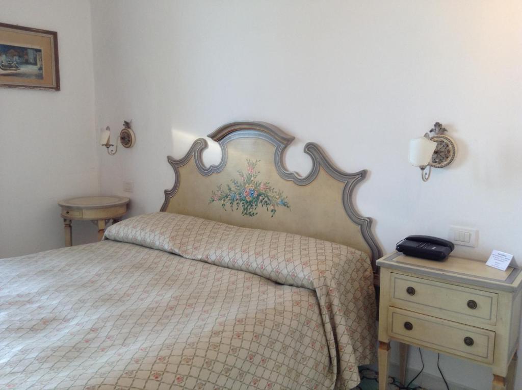 Posteľ alebo postele v izbe v ubytovaní Hotel Lidomare