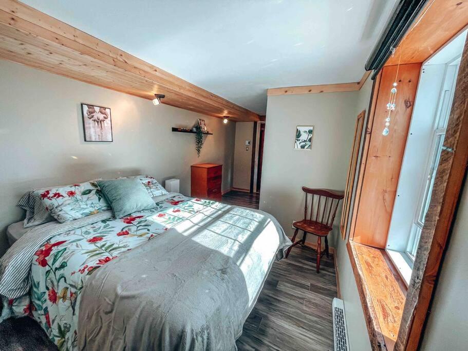 Postel nebo postele na pokoji v ubytování Logement Mandala tout équipé