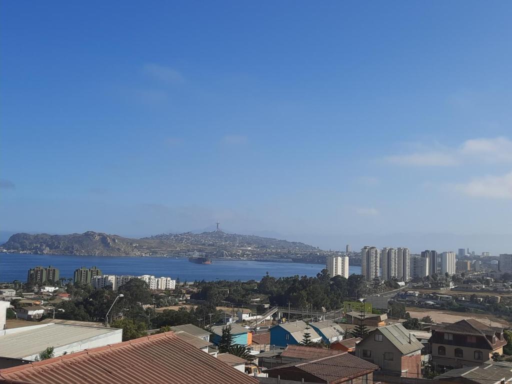 a view of a city and a body of water at La Casa Blanca Departamento 2 piscina temperada in Coquimbo