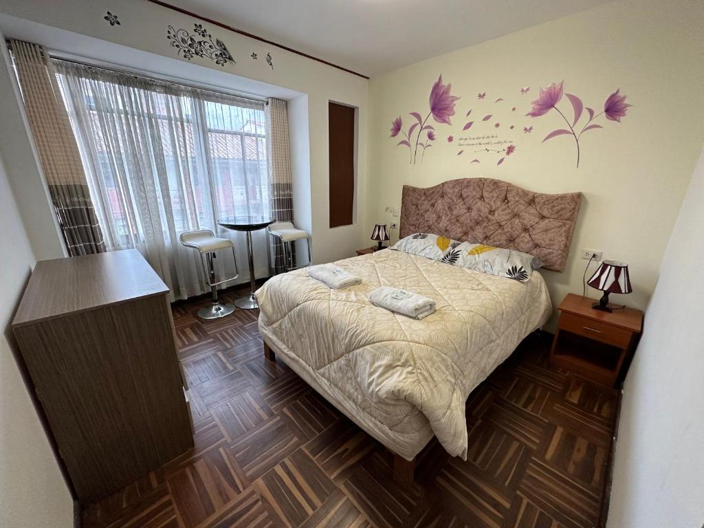 Postel nebo postele na pokoji v ubytování Euler House`s