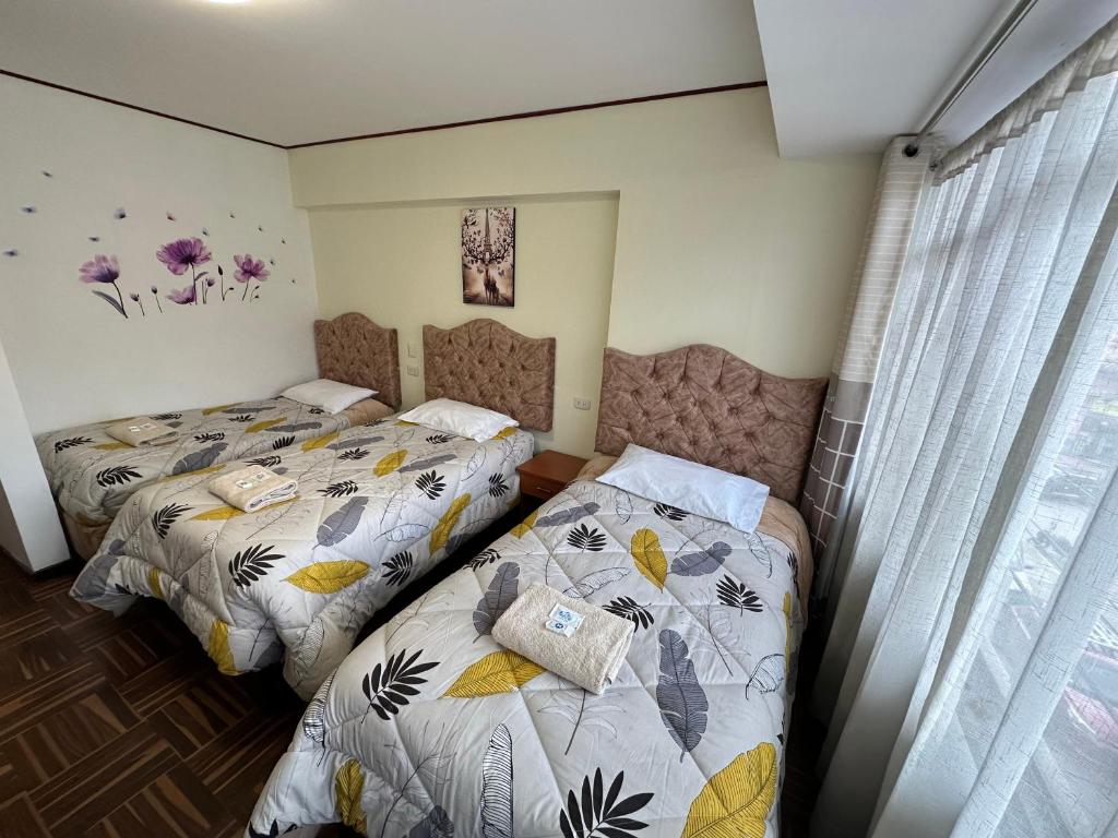 Postel nebo postele na pokoji v ubytování Euler House`s