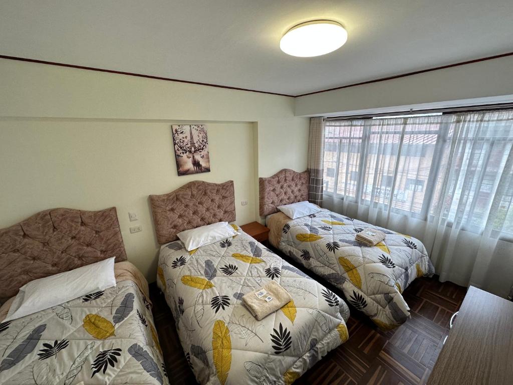 Postel nebo postele na pokoji v ubytování Euler House`s