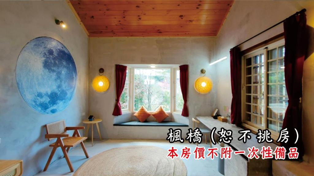 a bedroom with a bed and a window at Tingtau Villa in Lugu Lake