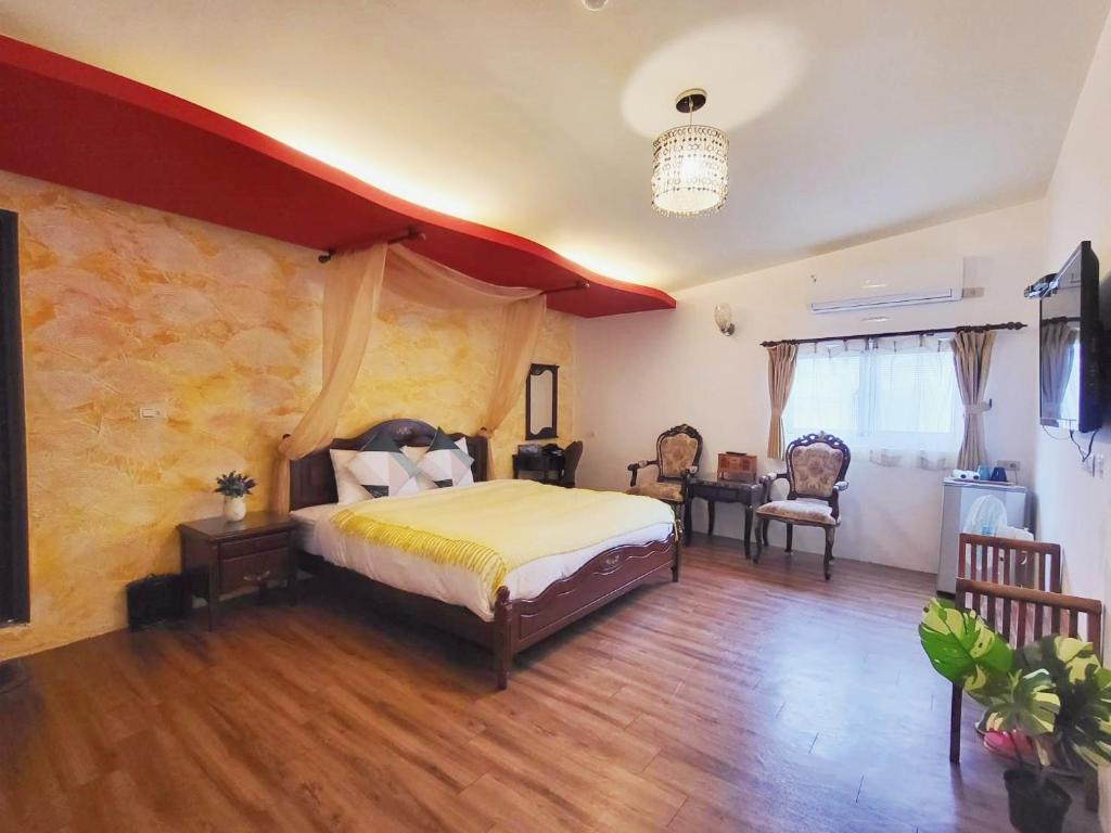 Letto o letti in una camera di Xing Ji Bungalow