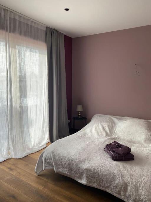 A bed or beds in a room at Eco-Chalet Matschiedl