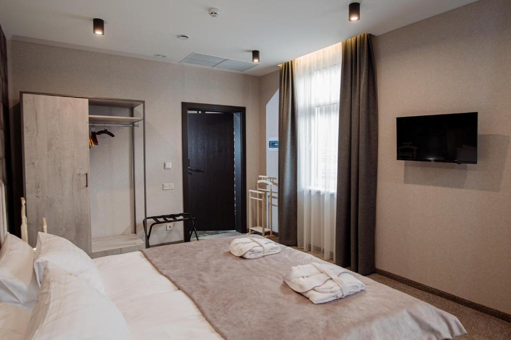 Postel nebo postele na pokoji v ubytování Hotel Boutique Refael