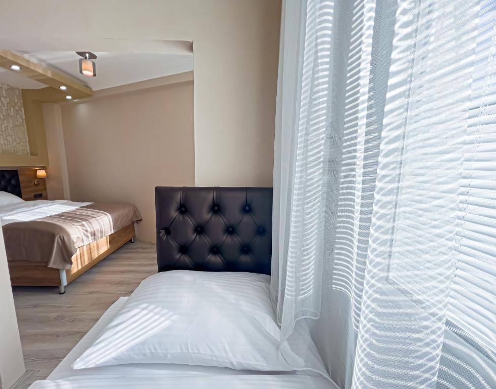 Helen Inn - Luxe Drievoudige Kamer